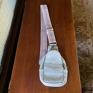 Sling bag cross body. With strap.